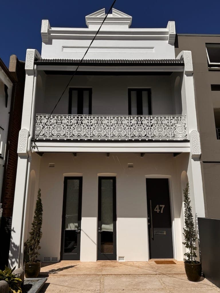 Cement rendering Sydney — finished white masonry facade